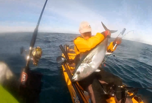 Fisho's Scott Thomas filming Bushy talking about Squidgy's new prawn lures.